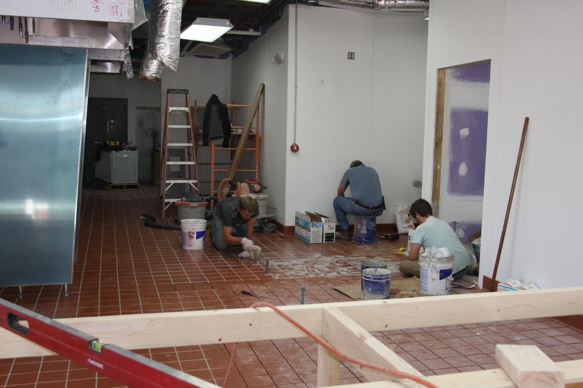 Floor tiled and in the cleaning process